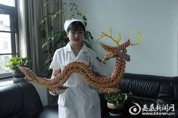 医院选送的医患合作手工艺品“福彩龙”获娄底福彩刮刮乐手工艺品大赛一等奖