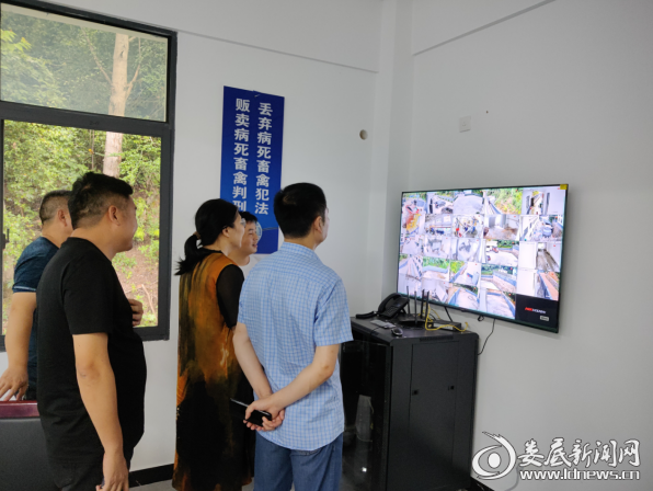 （调研组一行查看病死畜禽无害化处理情况）